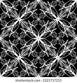 Seamless abstract pattern. Imitation lace. White lace on black background. Black and white graphics. For design and decoration of fabric, paper, Wallpaper and packaging.Mesh pattern.