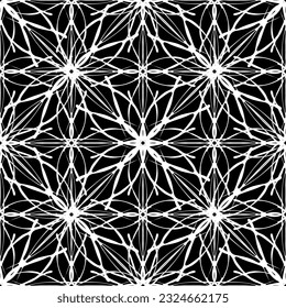 Seamless abstract pattern. Imitation lace. White lace on black background. Black and white graphics. For design and decoration of fabric, paper, Wallpaper and packaging.Mesh pattern.
