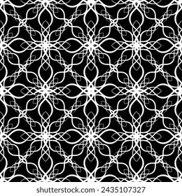 Seamless abstract pattern. Imitation lace. White lace on black background. Black and white graphics. For design and decoration of fabric, paper, Wallpaper and packaging.Mesh pattern.