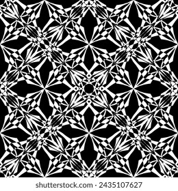 Seamless abstract pattern. Imitation lace. White lace on black background. Black and white graphics. For design and decoration of fabric, paper, Wallpaper and packaging.Mesh pattern.