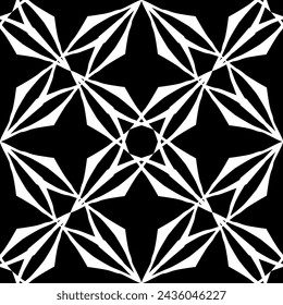 Seamless abstract pattern. Imitation lace. White lace on black background. Black and white graphics. For design and decoration of fabric, paper, Wallpaper and packaging.Mesh pattern.