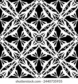 Seamless abstract pattern. Imitation lace. White lace on black background. Black and white graphics. For design and decoration of fabric, paper, Wallpaper and packaging.Mesh pattern.