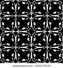 Seamless abstract pattern. Imitation lace. White lace on black background. Black and white graphics. For design and decoration of fabric, paper, Wallpaper and packaging.Mesh pattern.
