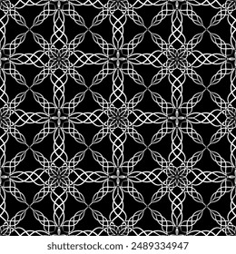 Seamless abstract pattern. Imitation lace. White lace on black background. Black and white graphics. For design and decoration of fabric, paper, Wallpaper and packaging.Mesh pattern.
