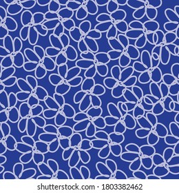 Patrón abstracto sin inconvenientes. Flores abstractas y claras sobre un fondo azul oscuro. La impresión es apta para fondos de escritorio.