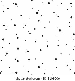Seamless abstract pattern of little circles and dots on white. Decorative wallpaper, good for printing. Vector illustration. Black and white