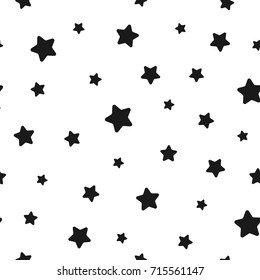 Seamless abstract pattern with little rounded black stars on white background. Vector illustration. Magic sky. Stardust background. Black and white. Constellation