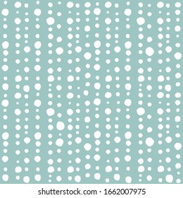 Seamless abstract pattern of little white shabby dots or spots on powder blue background. Hand drawn, offhand style. Decorative wallpaper, good for printing. Vector illustration. 