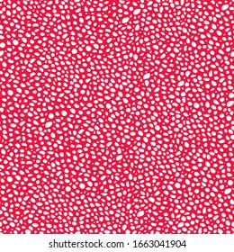 Seamless abstract pattern of little white chubby dots or spots on red. Hand drawn, offhand style. Vector decorative design for fabric, print, apparel. Red and white illustration
