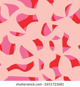 Seamless abstract pattern with organic cutout shapes in pink and red. Modern artistic collage style texture. Perfect for fabric, wallpaper, wrapping paper, apparel, stationery