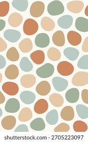 A seamless, abstract pattern of organic, pebble-like shapes in muted earth tones and soft blues and greens on a white background.