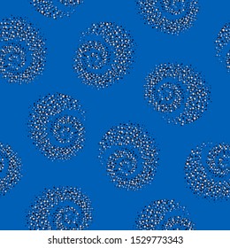 Seamless abstract pattern in paisley style. On a blue background, cute spirals consisting of dots. Print for textiles and paper. Vector illustration.