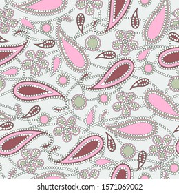 Seamless abstract pattern in paisley style. Print for textiles and paper in delicate green-pink colors. Vector illustration.