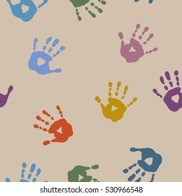Seamless abstract pattern with a prints of children's hands