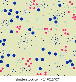 Seamless abstract pattern with red and blue circles on a beige background.