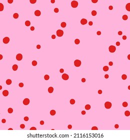 Seamless abstract pattern. Red dots . Pink background. vector texture. fashionable print for textiles, wallpaper and packaging.