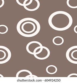 Seamless abstract pattern of the rings. Background texture. Vector endless illustration.