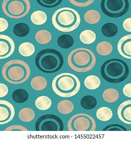 Seamless abstract pattern in scribble style with the image of rings and circles.

