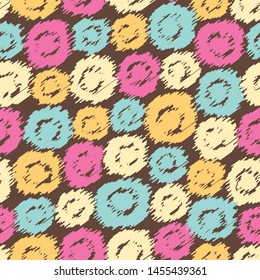 Seamless abstract pattern in scribble style with the image of oval geometric shapes.
