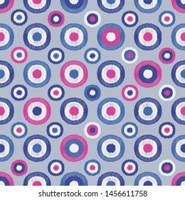 Seamless abstract pattern in scribble style with the image of rings and circles.

