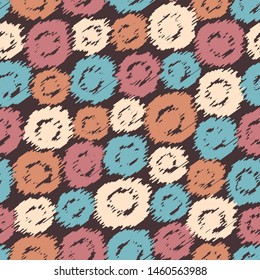 Seamless abstract pattern in scribble style with the image of oval geometric shapes.

