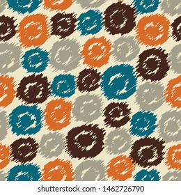 Seamless abstract pattern in scribble style with the image of oval geometric shapes.
