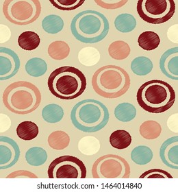 Seamless abstract pattern in scribble style with the image of rings and circles.
