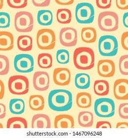 Seamless abstract pattern in scribble style with the image of oval geometric shapes.
