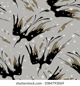 Seamless abstract pattern with silhouettes of fantastic birds and snowflakes.