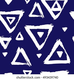 Seamless abstract pattern with triangles. Hand painted background.