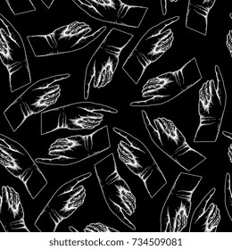 Seamless abstract pattern with vintage pointing human hands. White silhouetted outlines on black background. Etching old style.