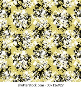 Seamless abstract pattern with white and black elements on yellow background