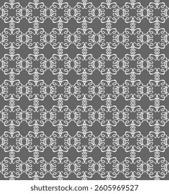 Seamless abstract pattern in white on grey background for fabric or wallpaper