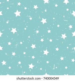 Seamless abstract pattern with white stars of different rotation and size. Grunge star powder blue background. Vector illustration. Cosmos texture with particles of debris