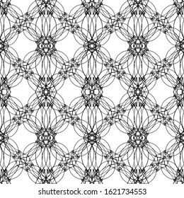 Seamless abstract pattern.Black lace on white background.Black and white graphics.For design and decoration of fabric, paper, Wallpaper and packaging.Grid pattern.Art Nouveau and art Deco pattern.