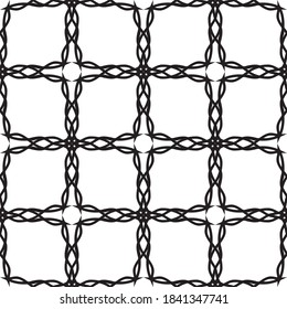 Seamless abstract pattern.Black lace on white background.Black and white graphics. Imitation lace. For design and decoration of fabric, paper, Wallpaper and packaging.Grid pattern.