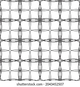 Seamless abstract pattern.Black lace on white background.Black and white graphics. Imitation lace. For design and decoration of fabric, paper, Wallpaper and packaging.Grid pattern.