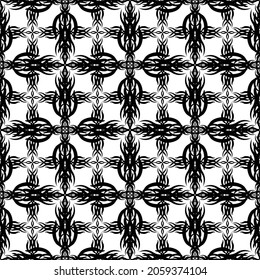 Seamless abstract pattern.Black lace on white background.Black and white graphics. Imitation lace. For design and decoration of fabric, paper, Wallpaper and packaging.Grid pattern.