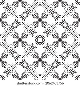 Seamless abstract pattern.Black lace on white background.Black and white graphics. Imitation lace. For design and decoration of fabric, paper, Wallpaper and packaging.Grid pattern.