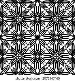 Seamless abstract pattern.Black lace on white background.Black and white graphics. Imitation lace. For design and decoration of fabric, paper, Wallpaper and packaging.Grid pattern.
