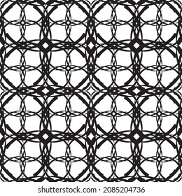 Seamless abstract pattern.Black lace on white background.Black and white graphics. Imitation lace. For design and decoration of fabric, paper, Wallpaper and packaging.Grid pattern.