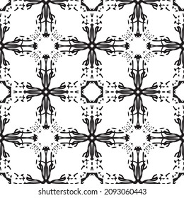 Seamless abstract pattern.Black lace on white background.Black and white graphics. Imitation lace. For design and decoration of fabric, paper, Wallpaper and packaging.Grid pattern.