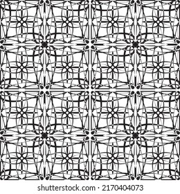 Seamless abstract pattern.Black lace on white background.Black and white graphics. Imitation lace. For design and decoration of fabric, paper, Wallpaper and packaging.Grid pattern.