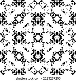 Seamless abstract pattern.Black lace on white background.Black and white graphics. Imitation lace. For design and decoration of fabric, paper, Wallpaper and packaging.Grid pattern.