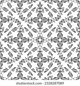 Seamless abstract pattern.Black lace on white background.Black and white graphics. Imitation lace. For design and decoration of fabric, paper, Wallpaper and packaging.Grid pattern.