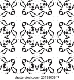 Seamless abstract pattern.Black lace on white background.Black and white graphics. Imitation lace. For design and decoration of fabric, paper, Wallpaper and packaging.Grid pattern.
