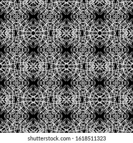 Seamless abstract pattern.Flat design.White lace on black background.Black and white graphics.Art Nouveau style.For the design and decoration of fabric, paper, Wallpaper and packaging.