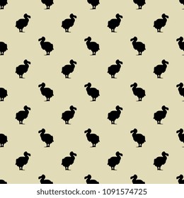 Seamless abstract polka dot pattern with small silhouettes of dodo bird. (Raphus cucullatus).