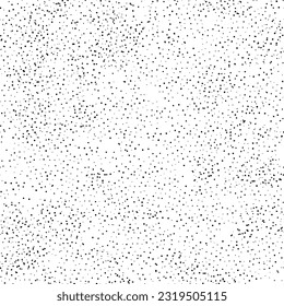 Seamless abstract polka dot pattern. Black hand drawn drip points on white background. Stone terrazzo texture, ink blots stain, grain, paint splash, spray effect. Vector grunge splattered illustration