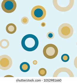 Seamless abstract polka dot repeating pattern in colors of blue, teal, gold and yellow